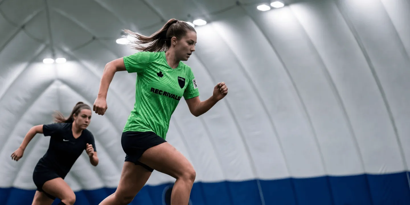 Women playing in an adult coed indoor soccer league in Mississauga